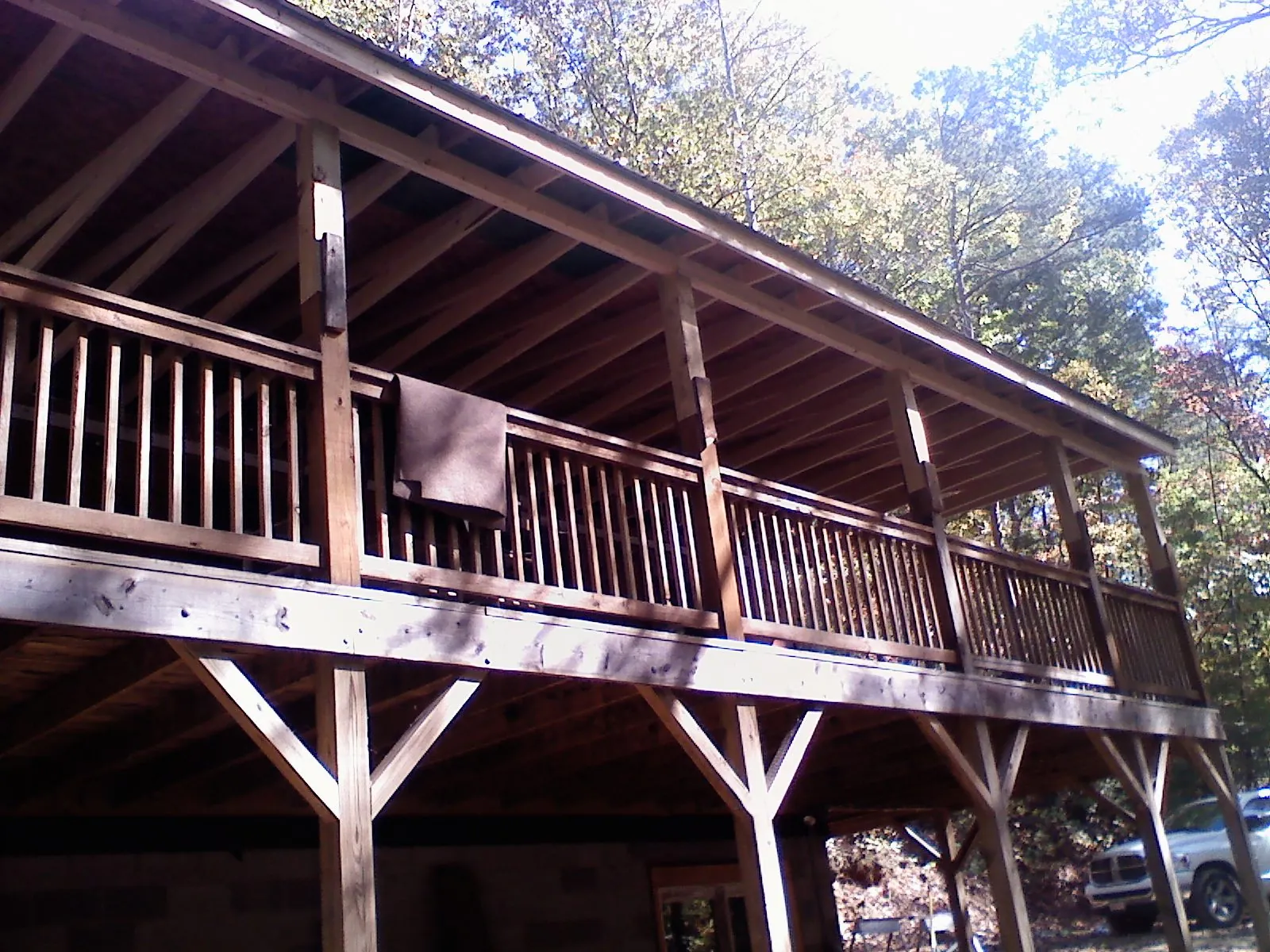 Timber framing under a new elevated porch and deck — Roof Leak Repair in Palm Desert by Roofing Brothers